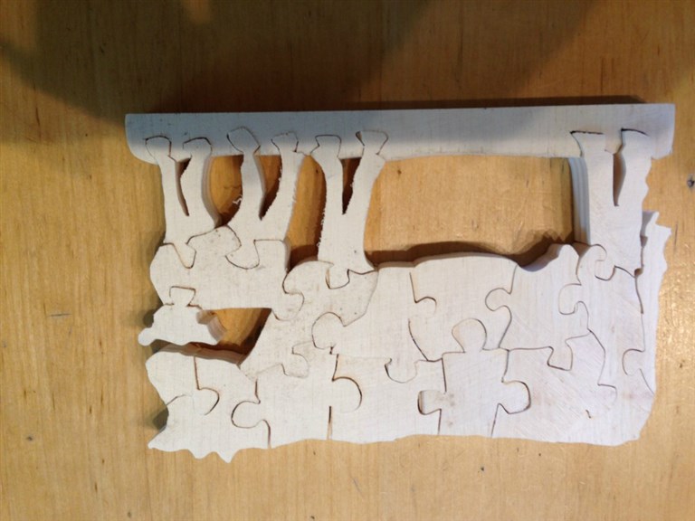 Kuh-Puzzle Pappel gebeizt:   handgefertigtes Holz - Puzzle aus 19 Teilen   mit Wachs-Beize behandelt 