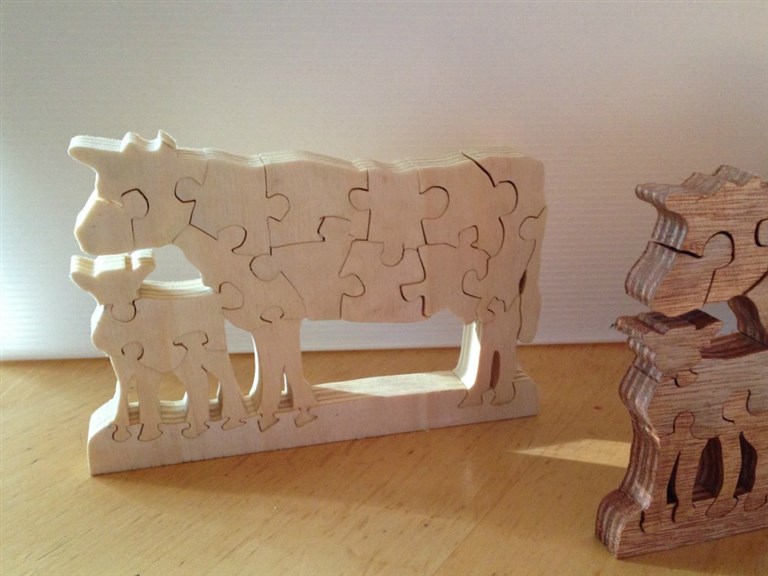 Kuh - Puzzle Pappel Natur:   Entzückendes Mutterkuh - Kalb Ensemble aus unbehandeltem Pappelholz.   Das